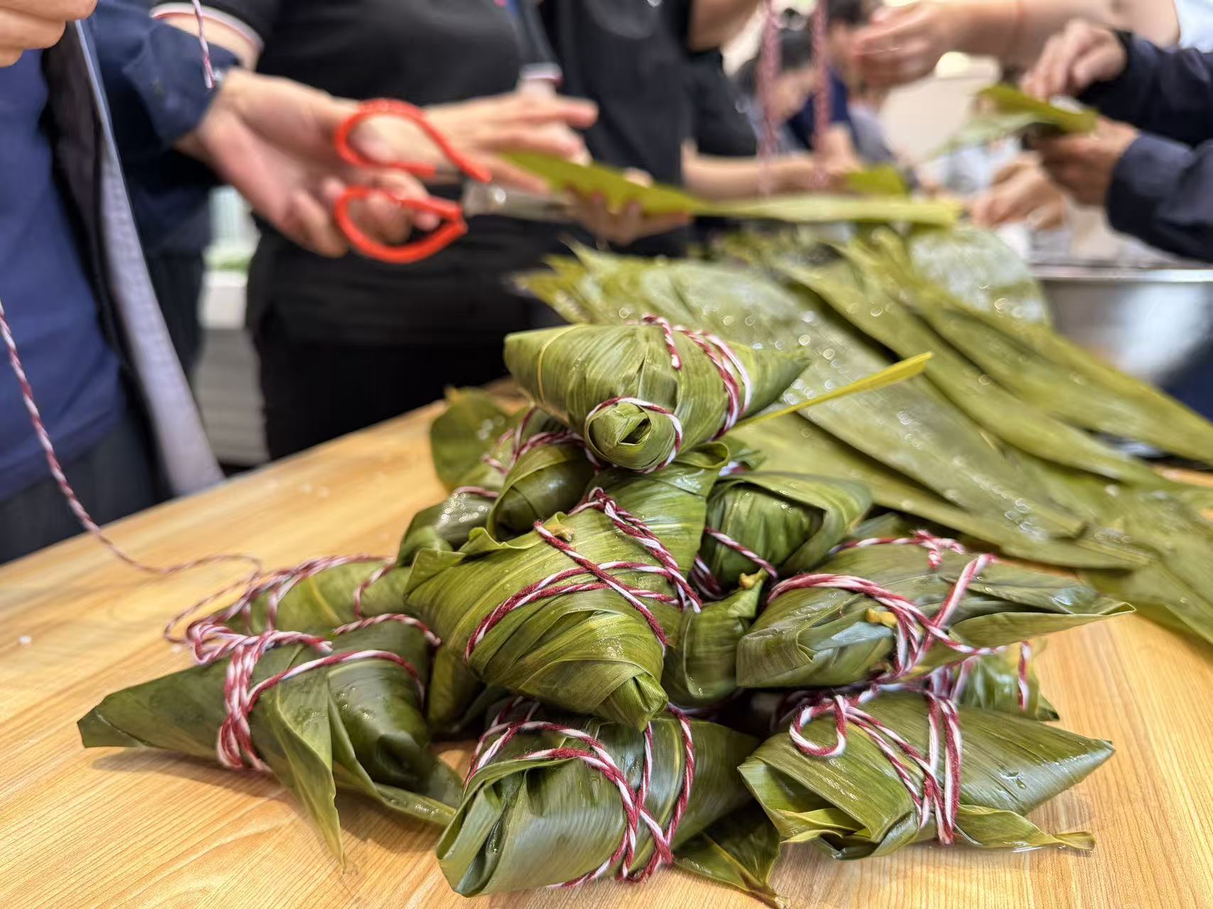 佳木斯物业举办端午包粽趣味赛(图3)
